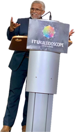 Mohamed Shareef presenting at a lectern bearing the ITU Kaleidoscope Geneva 2026 sign